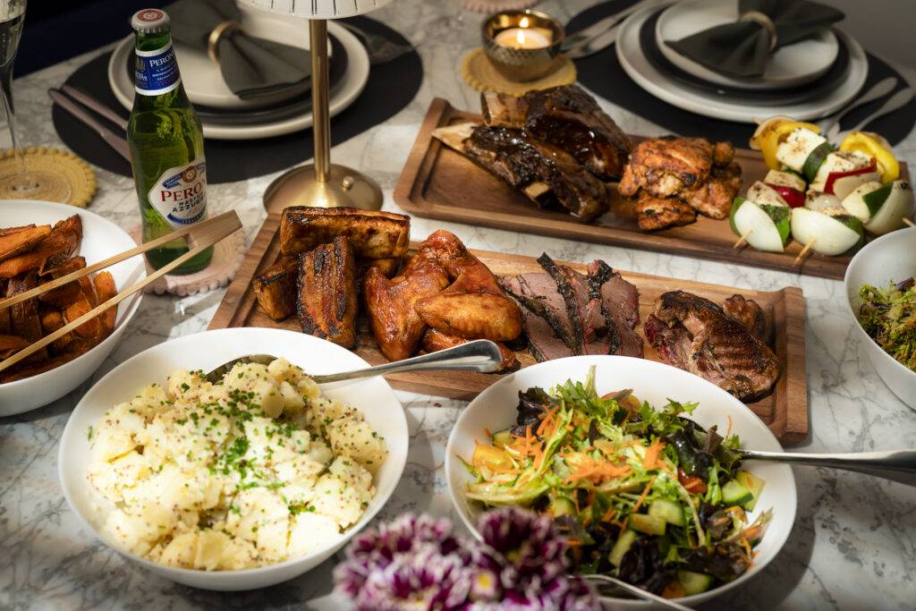 Blame Frank sharing feast of ribs, chicken wings and brisket boards with potato salad and slaw